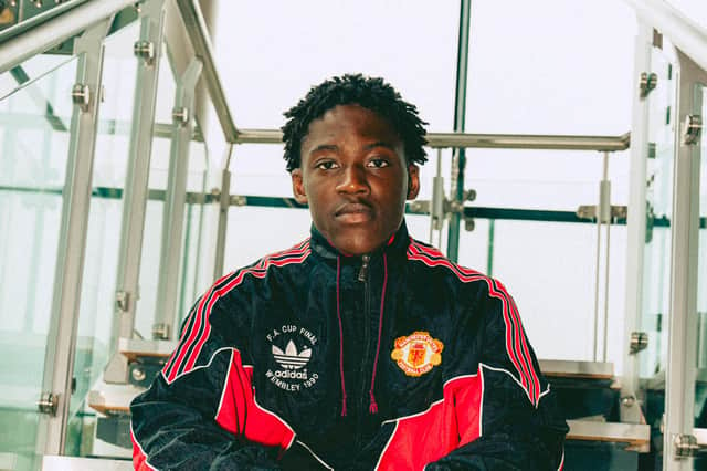 Kobbie Mainoo models an authentic anthem jacket from the 1990 FA Cup final