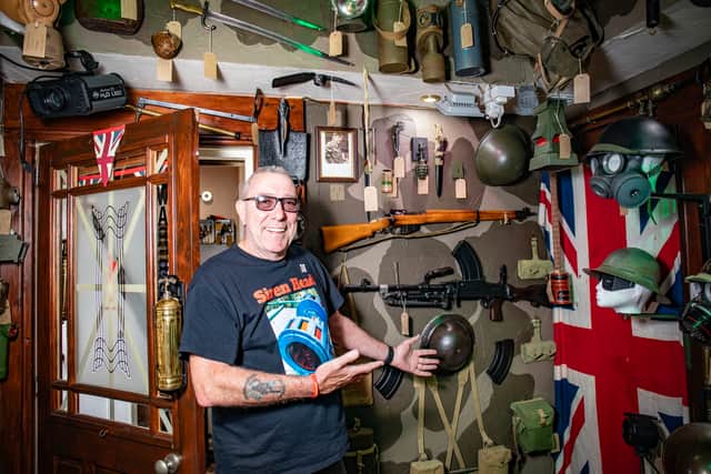Ray Fricker, an amateur historian from Droylsden, has spent £50k on war memorabilia, taking up a whole room in his house. Credit: William Lailey / SWNS